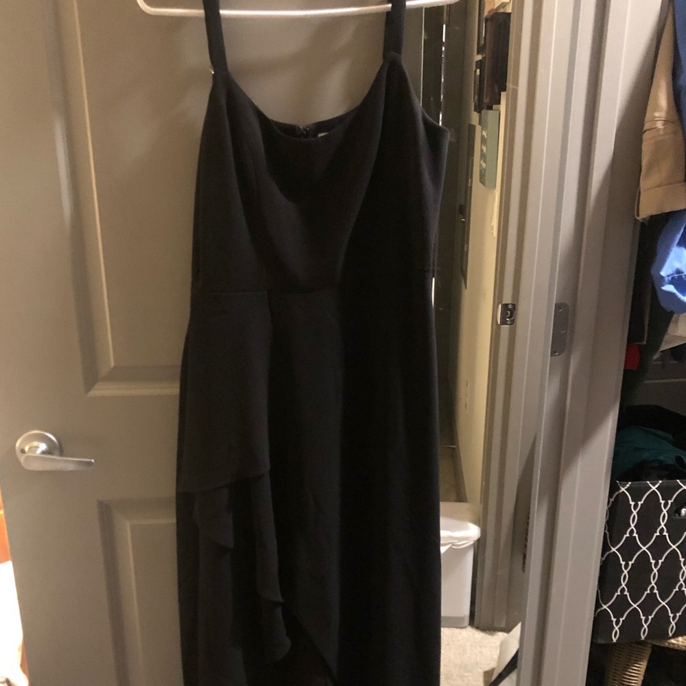 Black floor length dress. Opens on the side. Very cute and elegant.